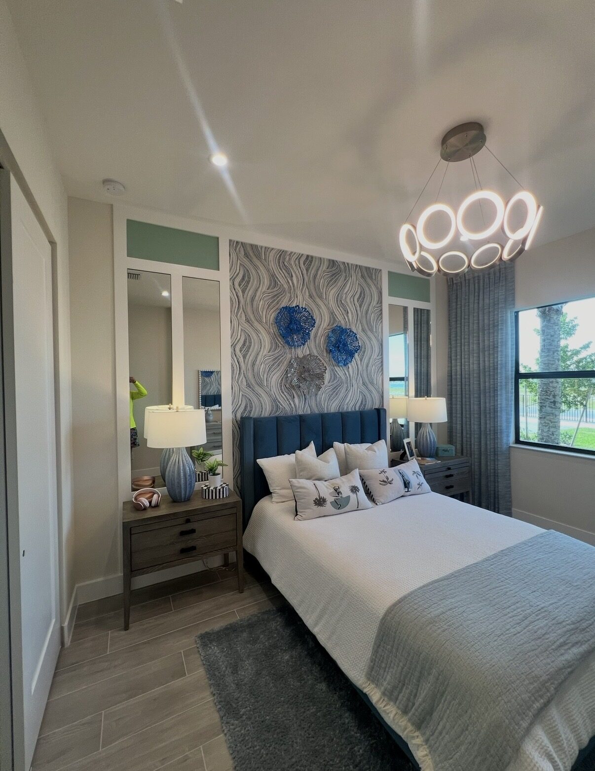 Master bedroom with modern lighting