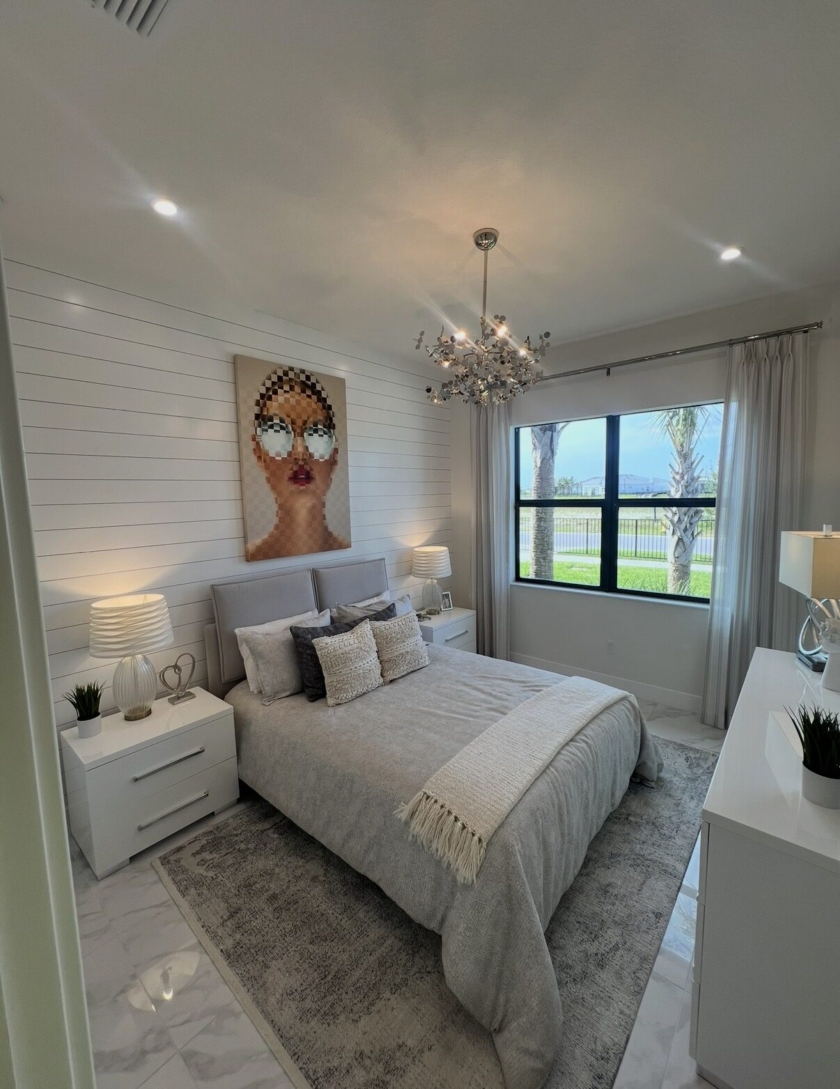 Bedroom with shiplap accent wall