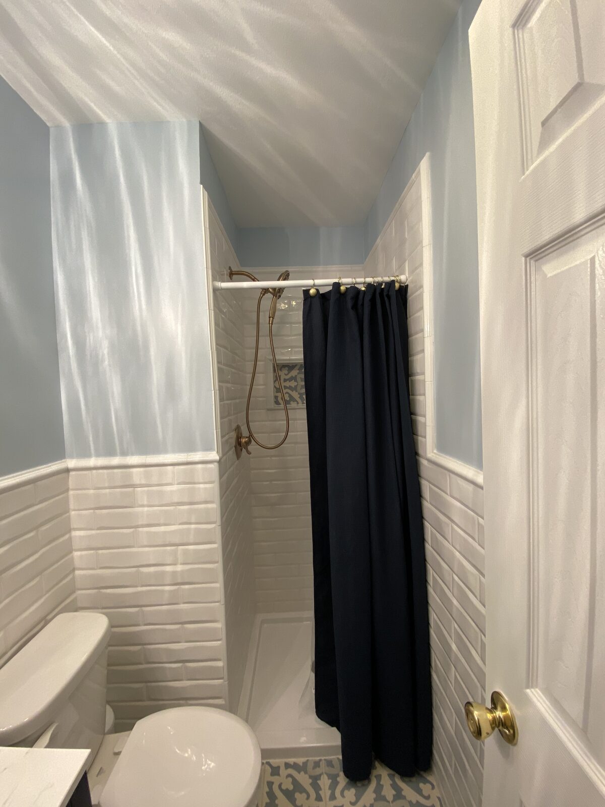 Bathroom with tiled wainscoting